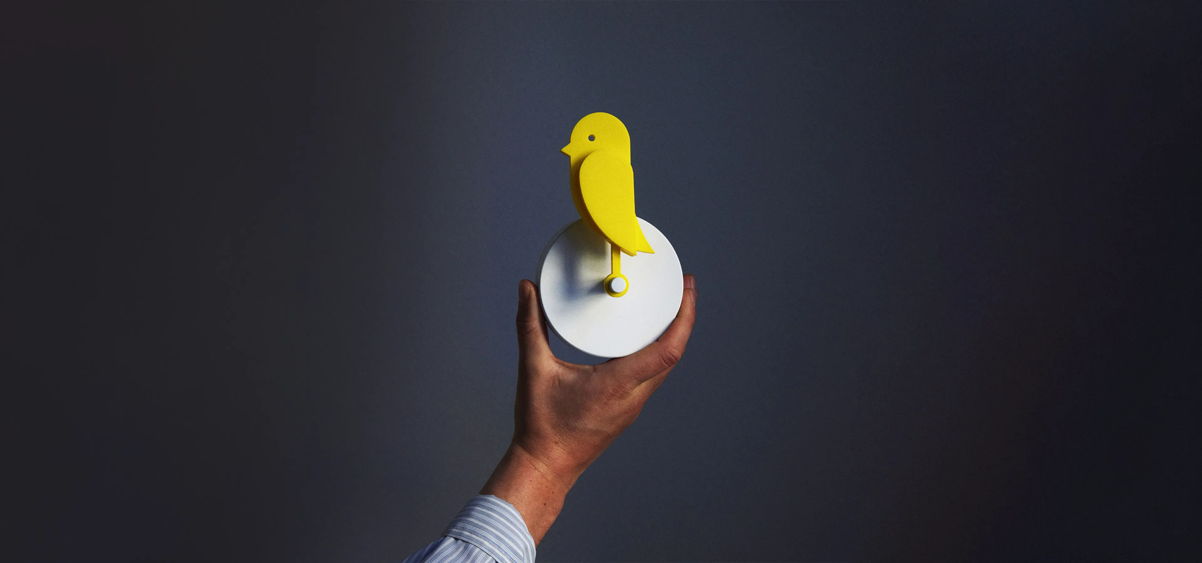 Hand holding 'Birdy', a poetic take on an air quality monitor for the home
